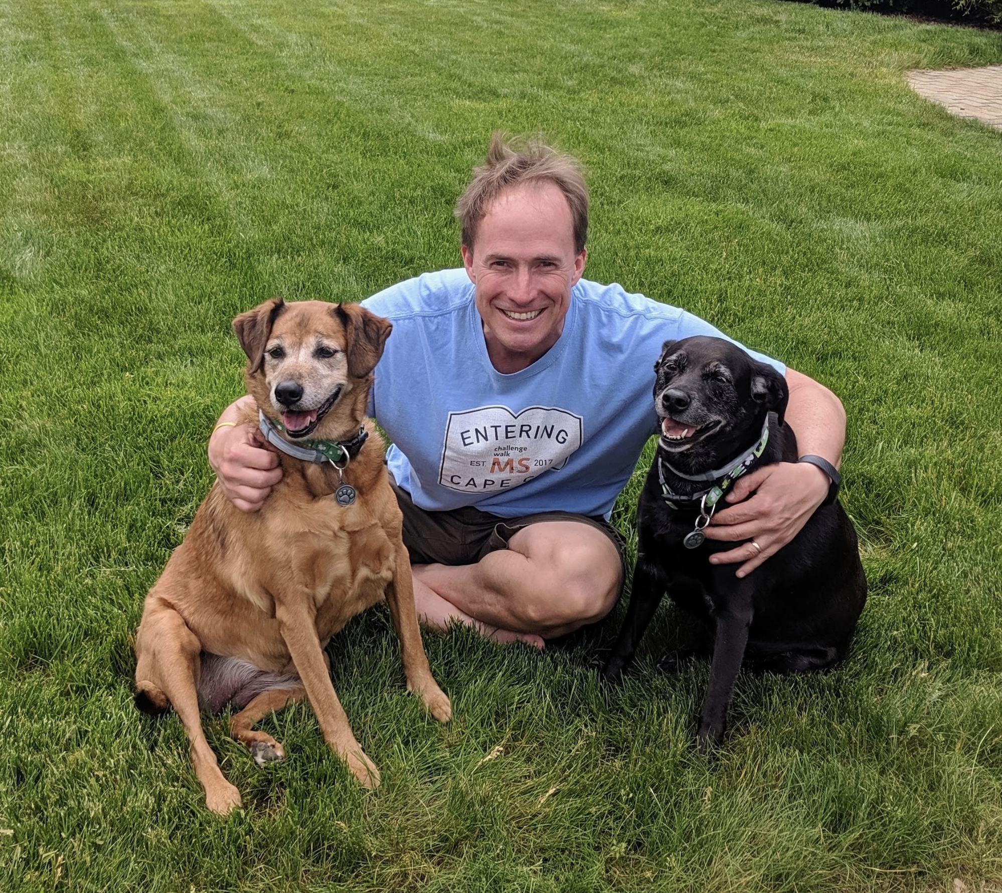 Paul with happy pups
